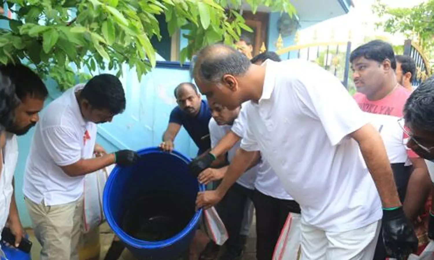 Harish Rao sets cleanliness example by picking up garbage in Siddipet