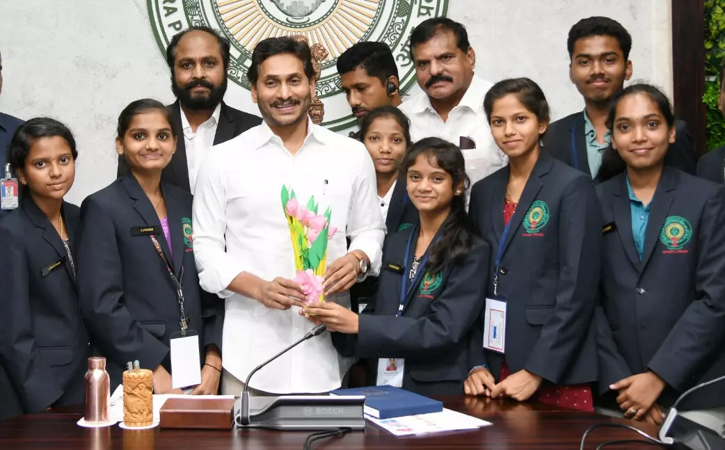 US-returned AP Govt school students meets YS Jagan