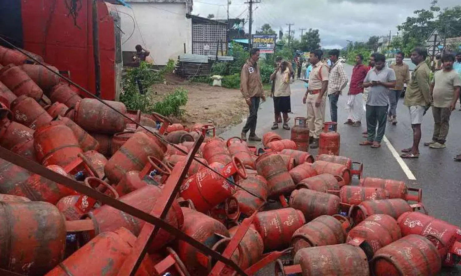 Lorry carrying gas cylinders overturns in Warangal