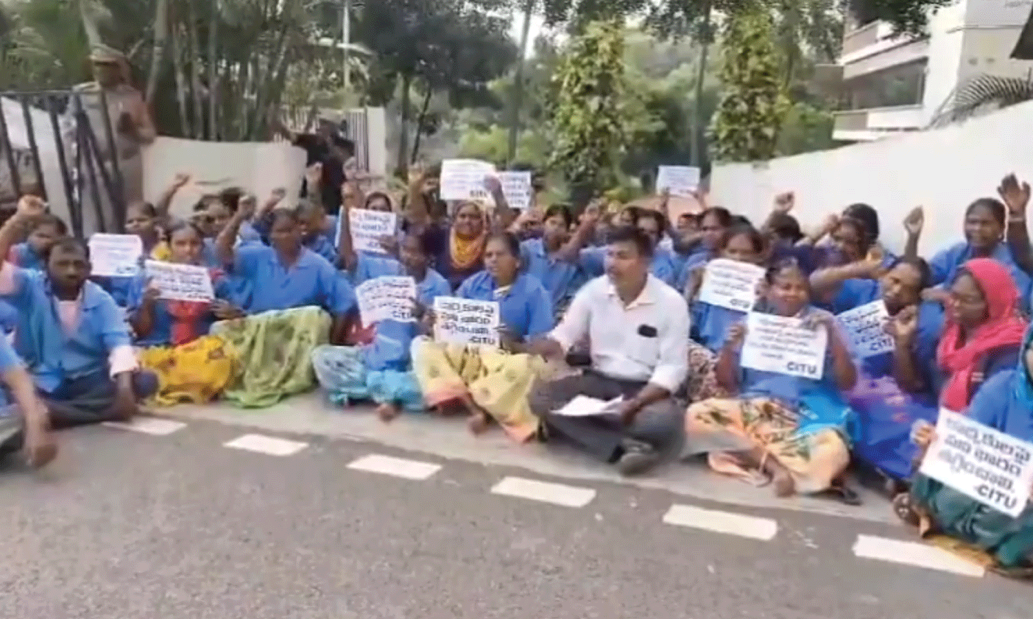 Sanitation workers protest outside GHMC office despite heavy rain, demand fair wages