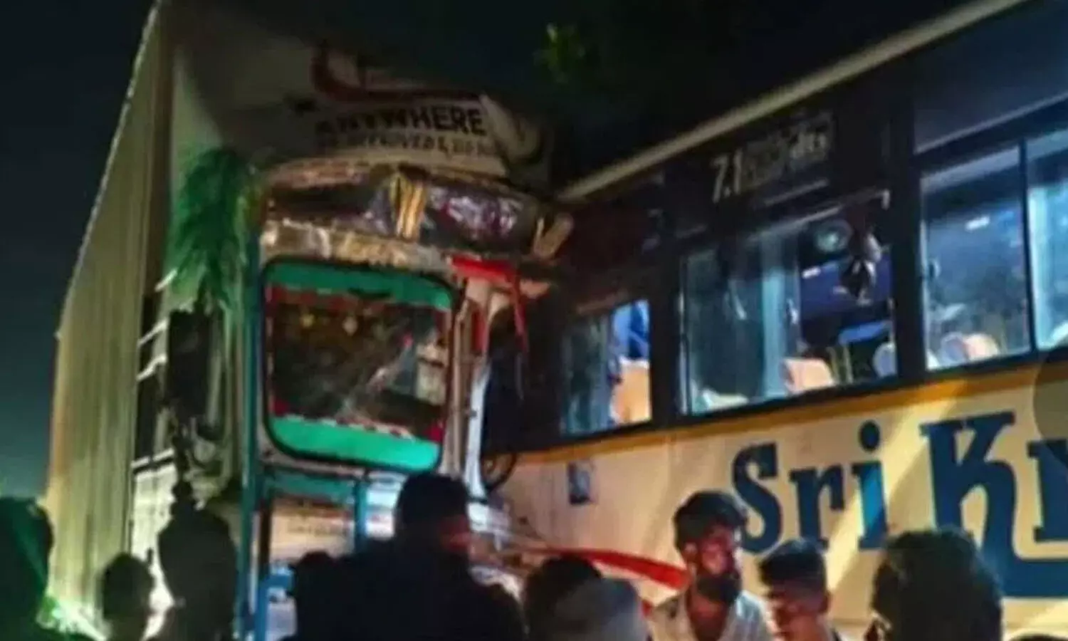 Two killed as lorry hits stationary bus at Choutuppal