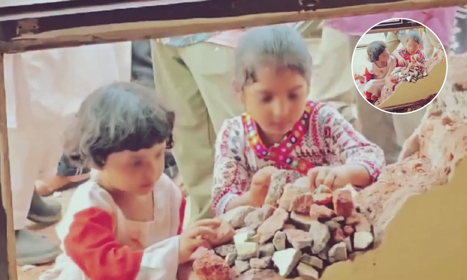 Children try to rebuild house from rubble after demolitions in Musi area